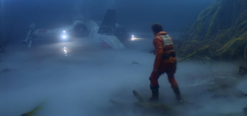 Still from Star Wars: The Empire Strikes Back - Luke Skywalker staring at his sinking X-Wing in Dagobah's swamp.